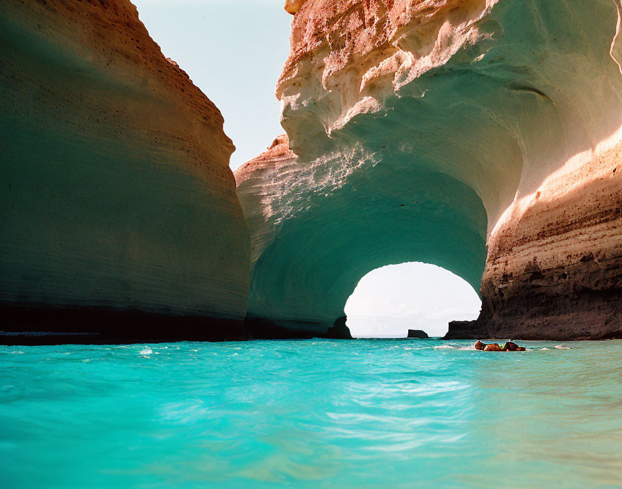 Caves, blue sea