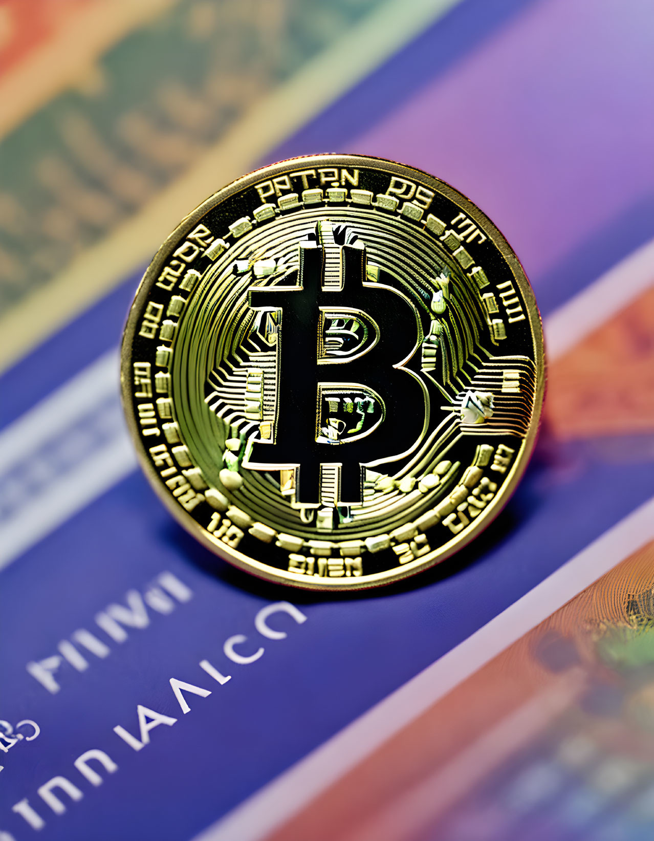 Golden Bitcoin on Colorful Banknotes: Cryptocurrency and Traditional Money Representation