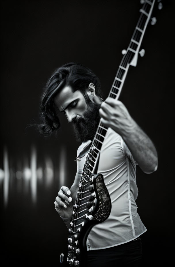 Monochromatic image: Bearded man playing electric guitar