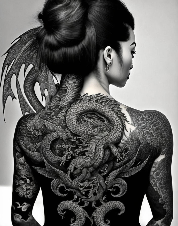 Woman displaying intricate full-back dragon tattoo design