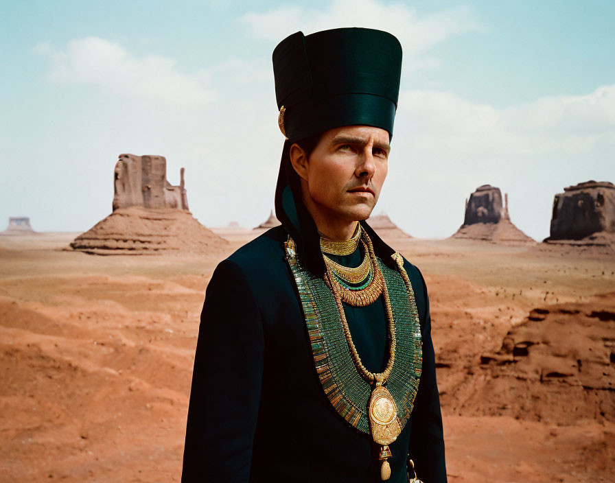Traditional Egyptian-style costume man in desert with rock formations