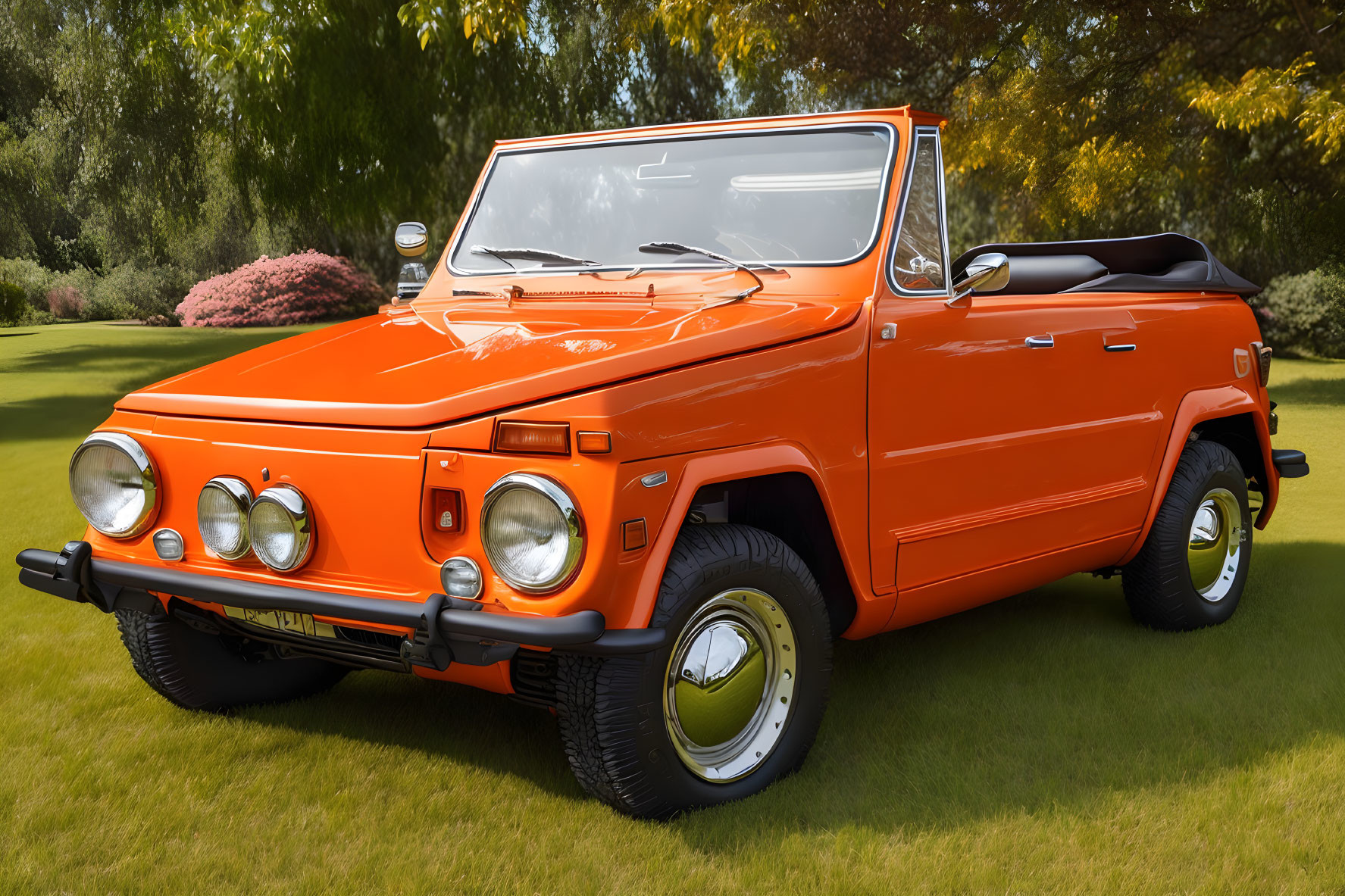 Classic Orange Convertible SUV with Chrome Accents Parked on Grass