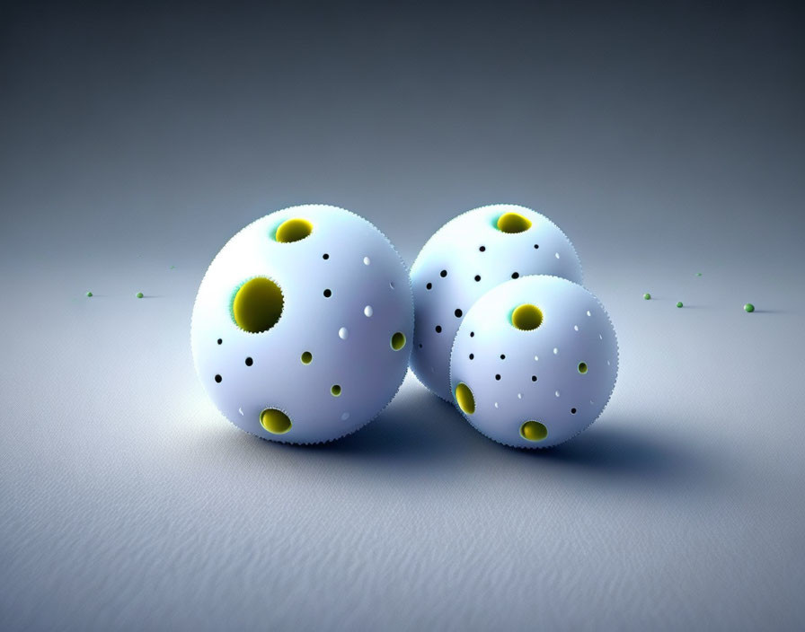 White patterned spheres with yellow and blue accents on gray surface.