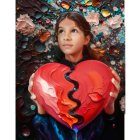 Vibrant cracked heart held by young girl in colorful, abstract setting