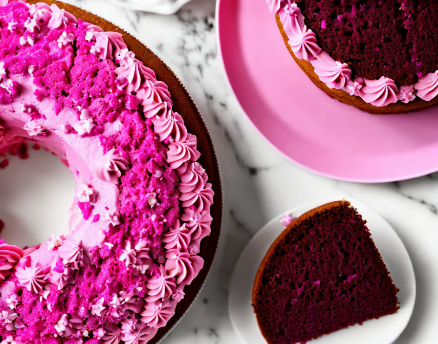  pink cake on a white platter 