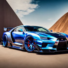 Blue Racing Car with Bold Stripes and Aftermarket Modifications on Sand Dunes