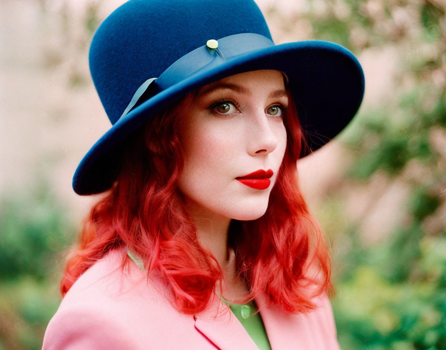 Beautiful young woman in a bowler hat, red hair