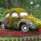 Colorful Flower-Adorned Car in Enchanted Garden with Vintage Carriage
