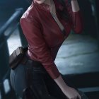 Female in red leather jacket with guns in dimly lit setting