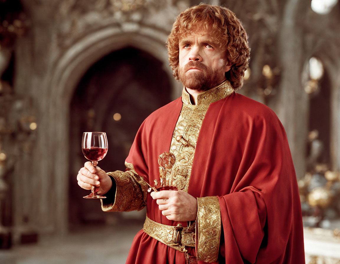Luxurious man in red and gold robe holding a wine glass in ornate room