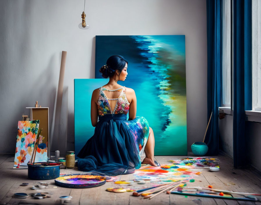 woman painting a canvas