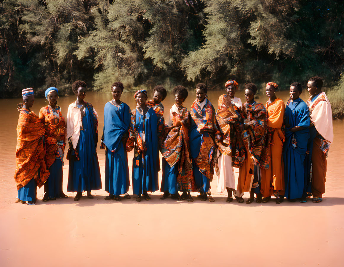 African Attired Group by River and Trees