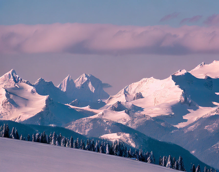 A frozen mountain range with snow-capped peaks