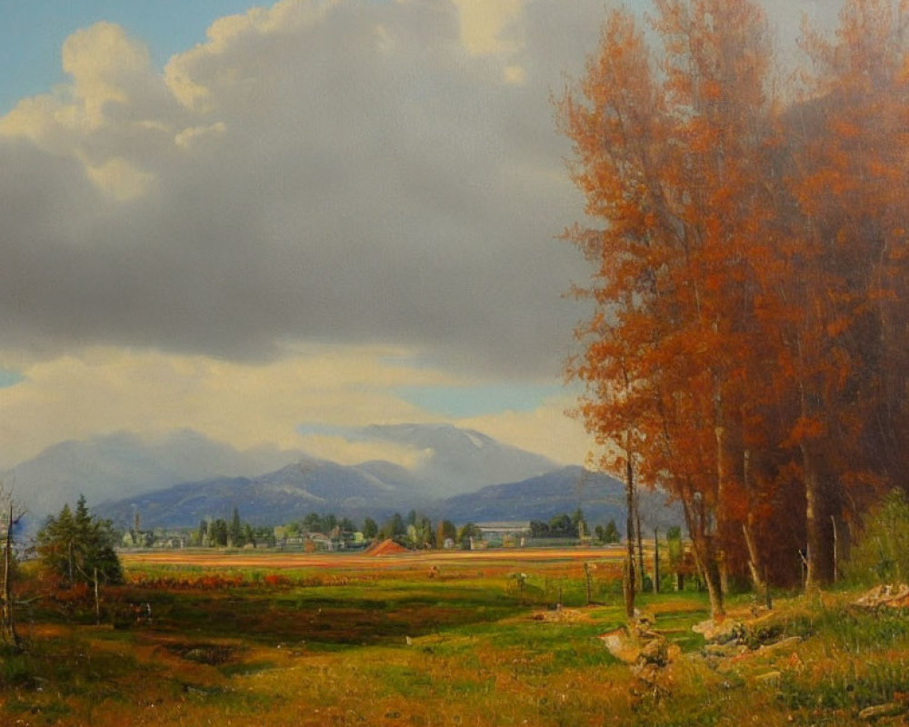 Scenic autumn landscape with golden trees, field, and mountains