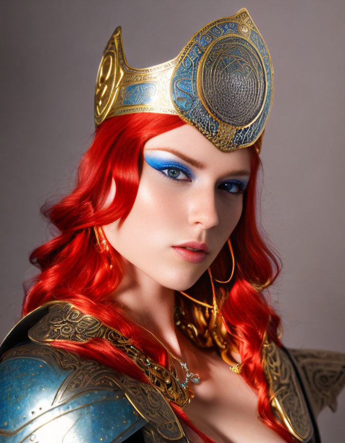 Vibrant red-haired person in golden crown and blue armor