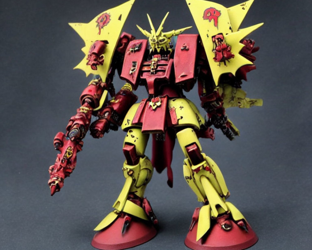 Detailed Red and Yellow Mecha Model with Shoulder Panels, Markings, and Horned Helmet