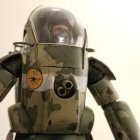 Detailed futuristic soldier model in combat with battle damage and debris effects