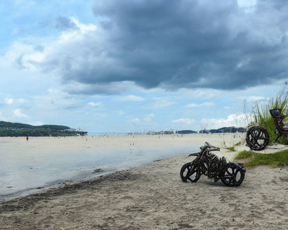 Tranquil beach scene with two motorcycles, calm waters, and cloudy sky