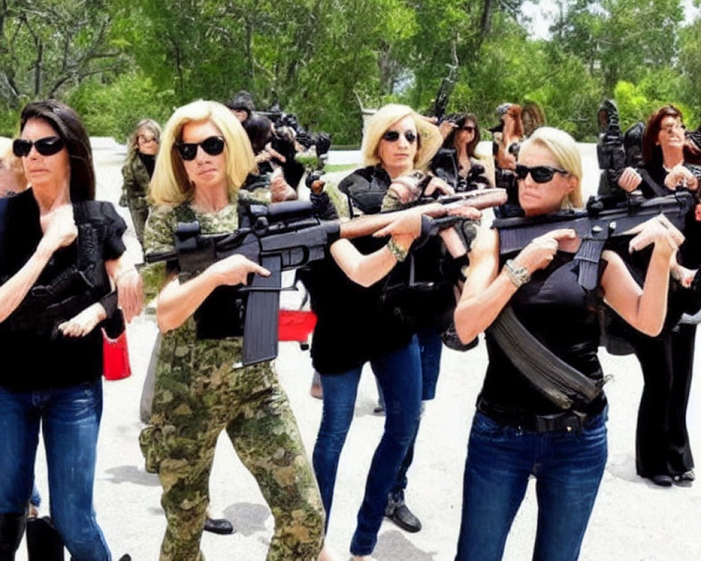 Women in different outfits with rifles aiming in outdoor setting