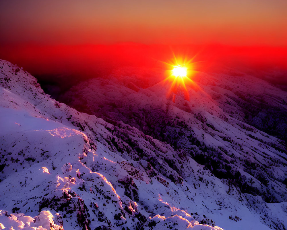 Snowy Mountain Landscape at Sunrise: Warm Glow Against Cool Blues