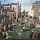 Historic Venetian canal scene with gondolas and crowds in period attire