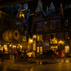 Detailed Fantasy Tavern Interior with Candlelit Tables & Stained Glass Windows