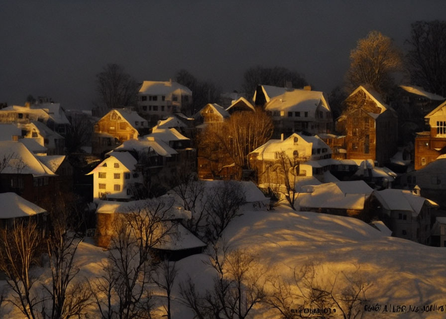 Snow-covered neighborhood with warm twilight glow and bare trees.