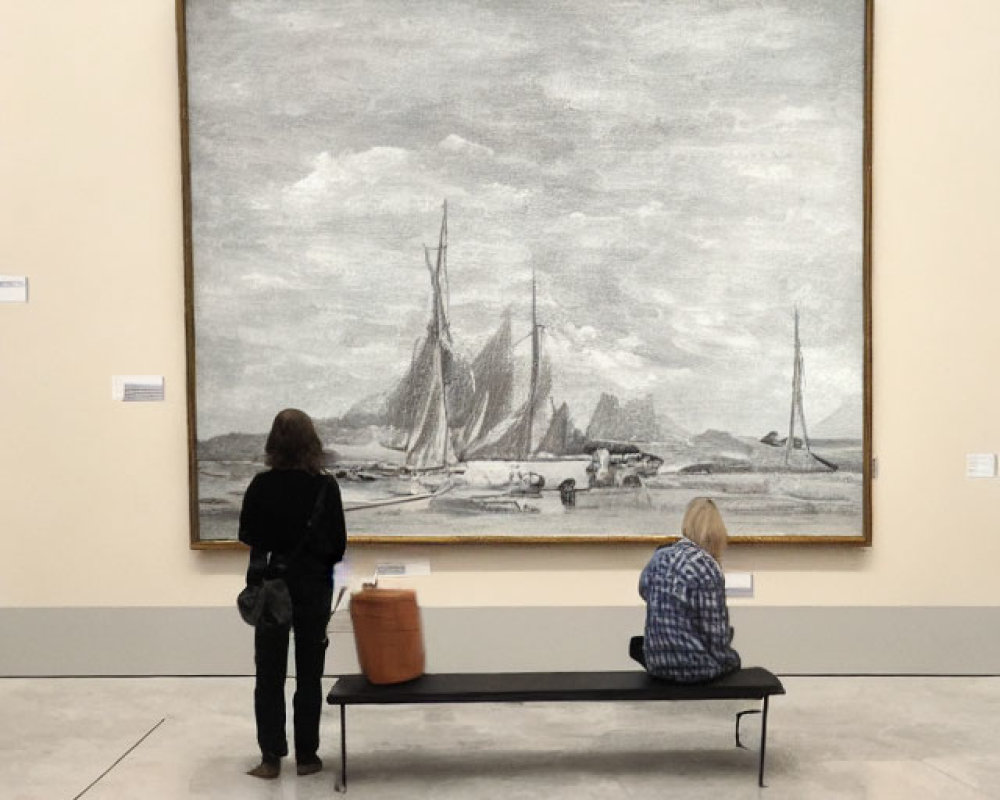 Gallery scene with two people viewing monochrome sailing ships painting