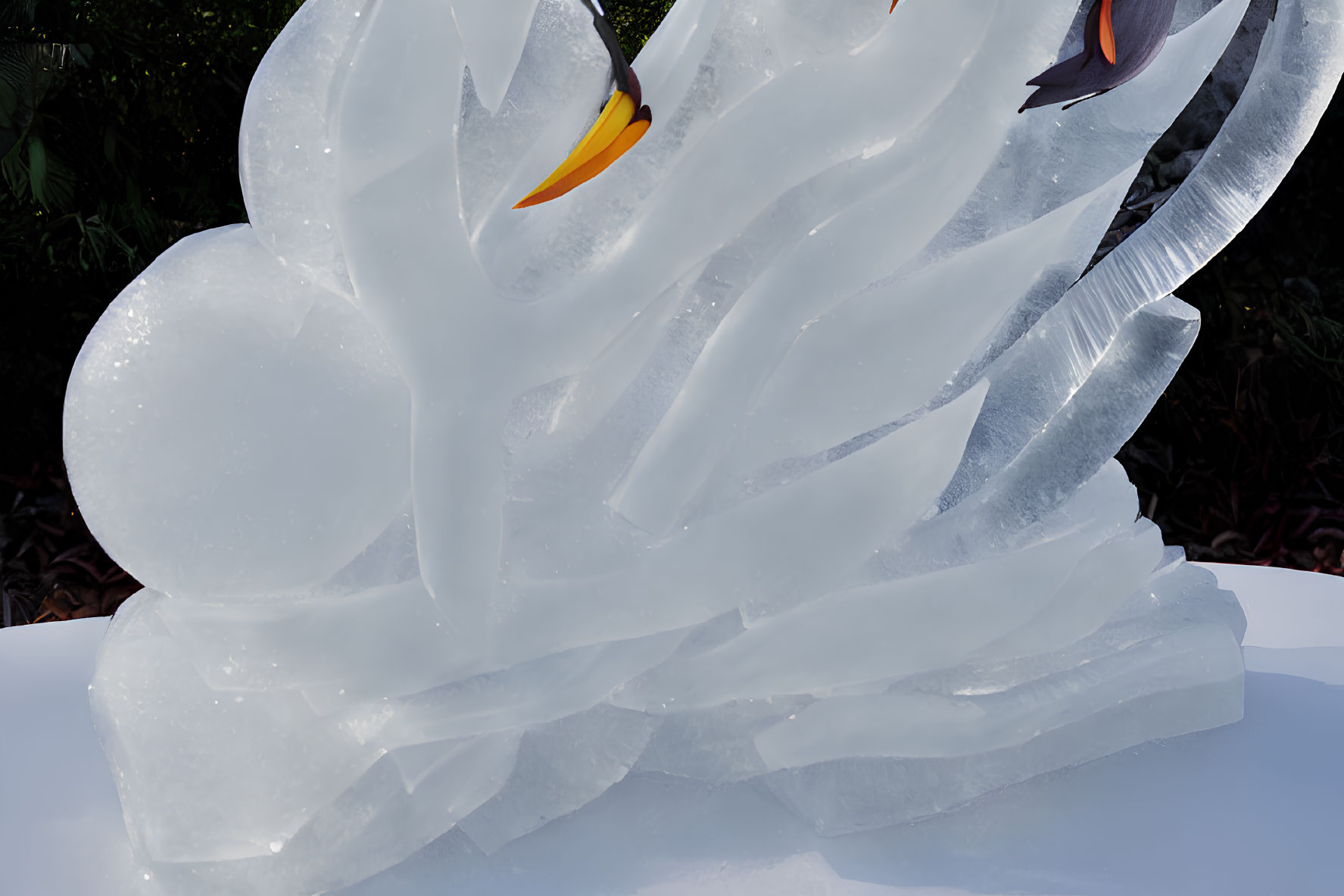 Detailed ice sculpture with swirling forms and bird beak-like elements