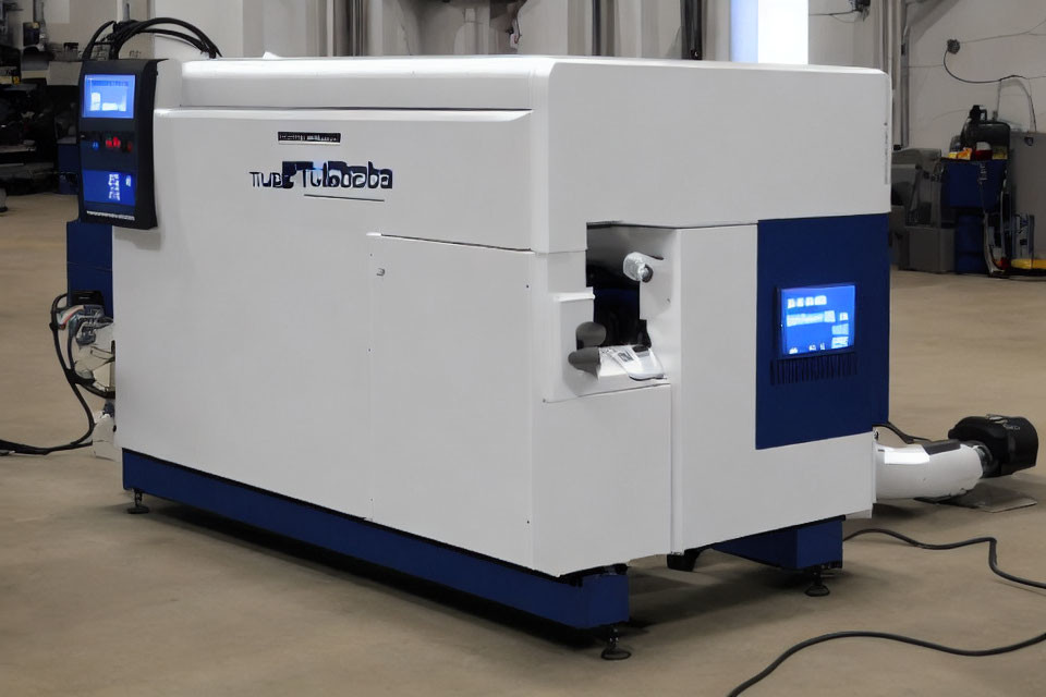 White and Blue Industrial CNC Machine with Digital Display and Robotic Arm
