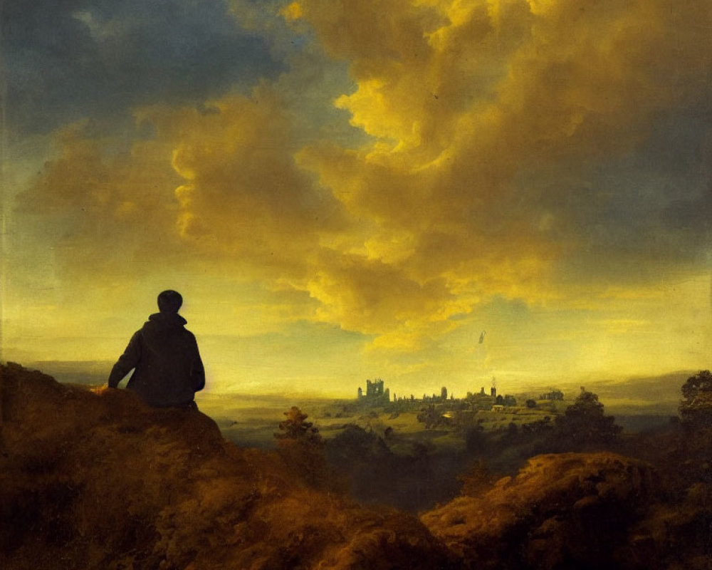 Solitary figure on rocky outcrop gazes at vast sunset landscape with distant city silhouette