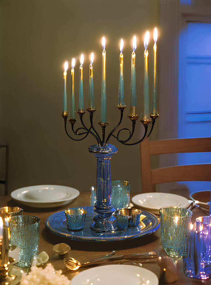 Classically Elegant Blue Candlelit Table Setting with Matching Tableware