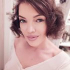 Vintage Glamour: Stylized Portrait of Woman with Retro Wavy Hair