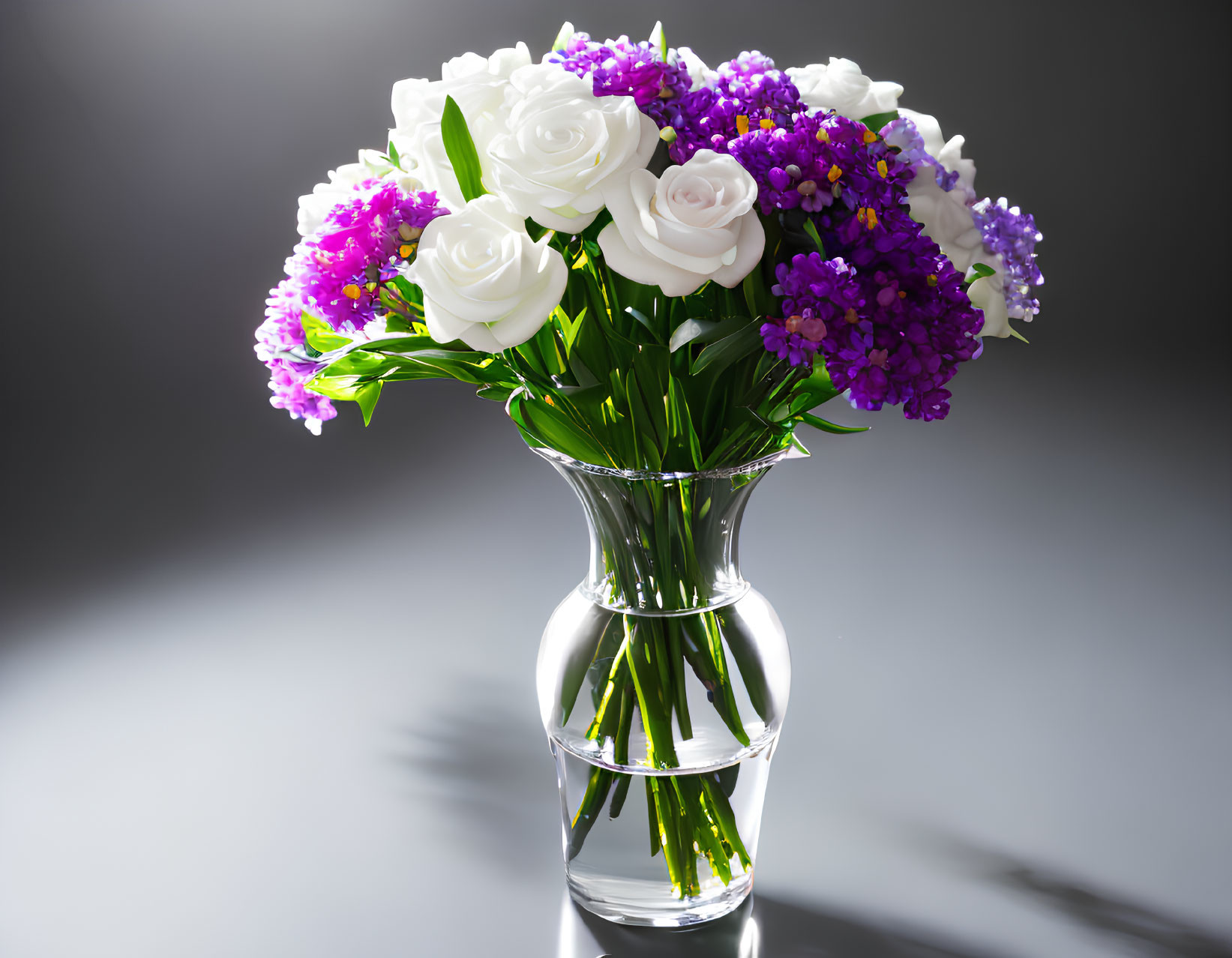White Roses and Purple Flowers in Clear Glass Vase on Gray Background