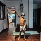 Muscular Gladiator in Luxurious Room with Classical Statues