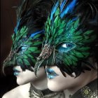 Ornate feathered headdresses on figures with intricate accessories