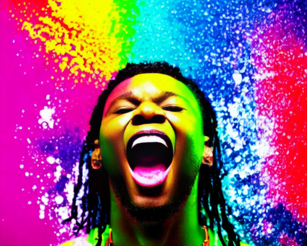 Joyful person with dreadlocks shouting against vibrant multicolored background