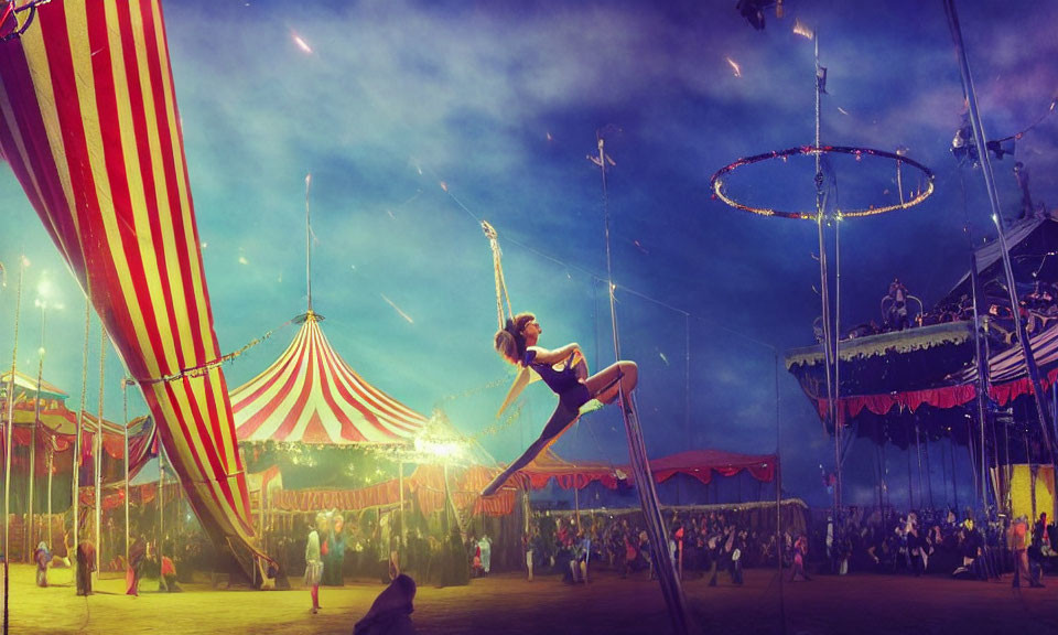 Aerial hoop act at circus with vibrant tents and onlookers