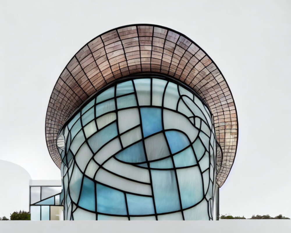 Glass façade and curved brown-tiled overhang on modern building under cloudy sky