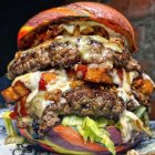 Double Cheeseburger with Beef Patties, Melted Cheese, Lettuce, Tomatoes,
