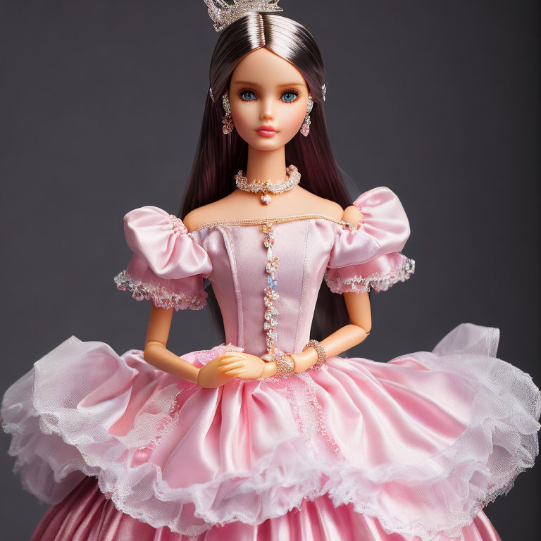 Elegant Pink Ball Gown Doll with Tiara and Jewelry on Grey Background