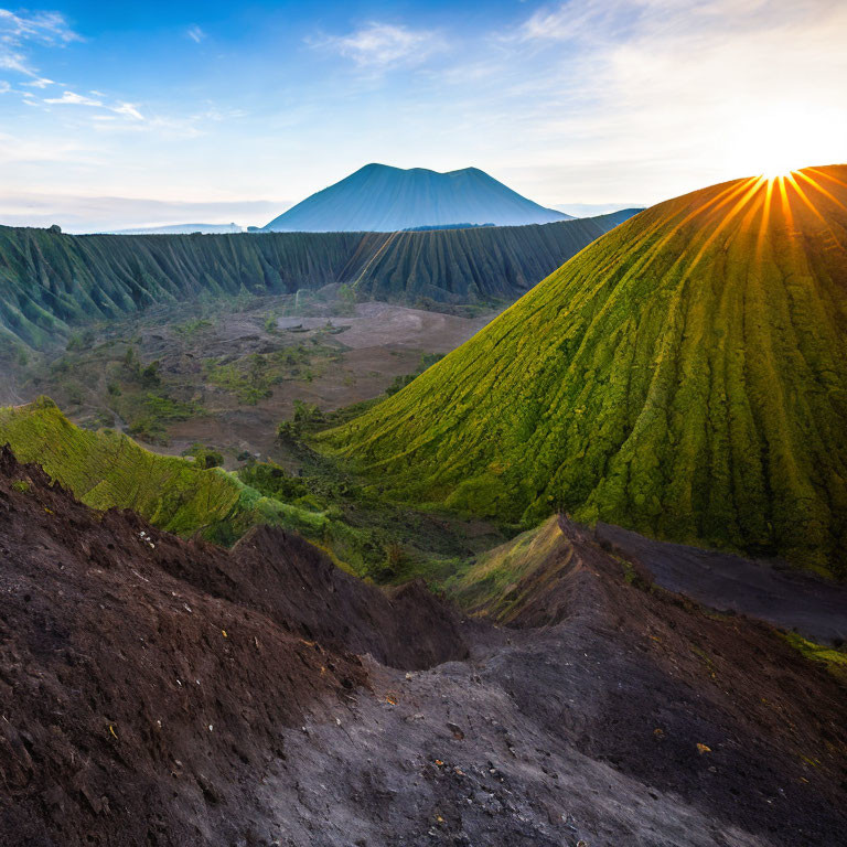 Majestic volcano in lush sunrise landscape