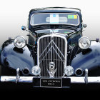 Classic Vintage Car Frontal View with Chrome Details and Intricate Grille