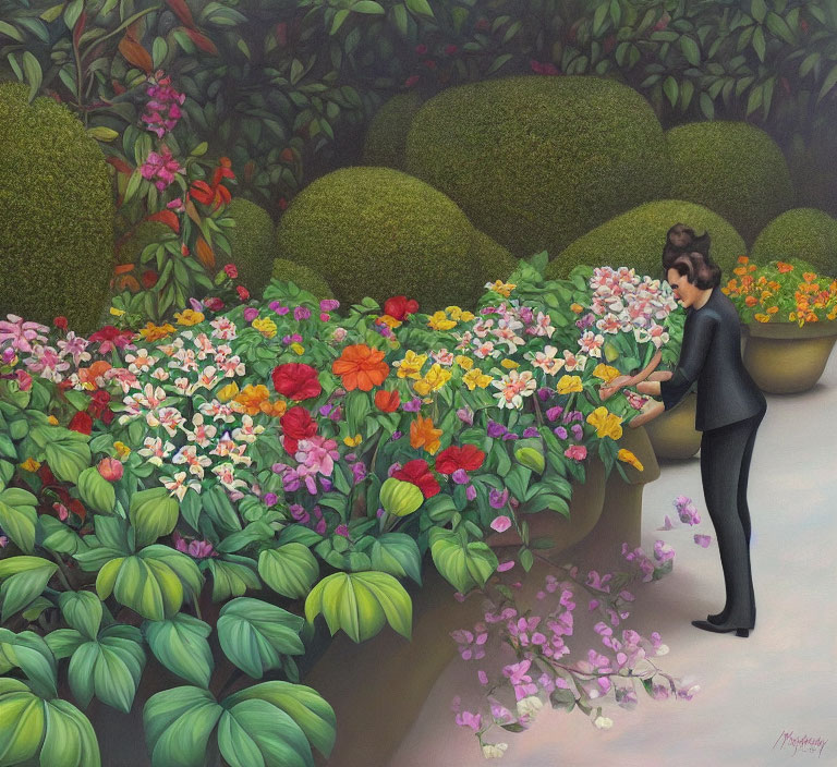 Person tending vibrant flowerbed in lush garden setting