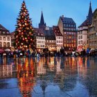 Snowy town square with Christmas tree & festive buildings