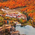 Picturesque Autumn Village by Calm Lake