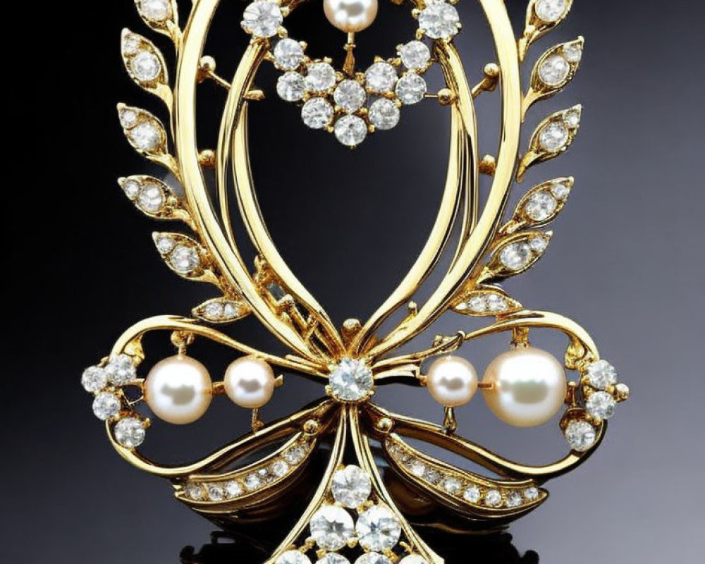 Intricate gold brooch with diamonds and pearls on dark background