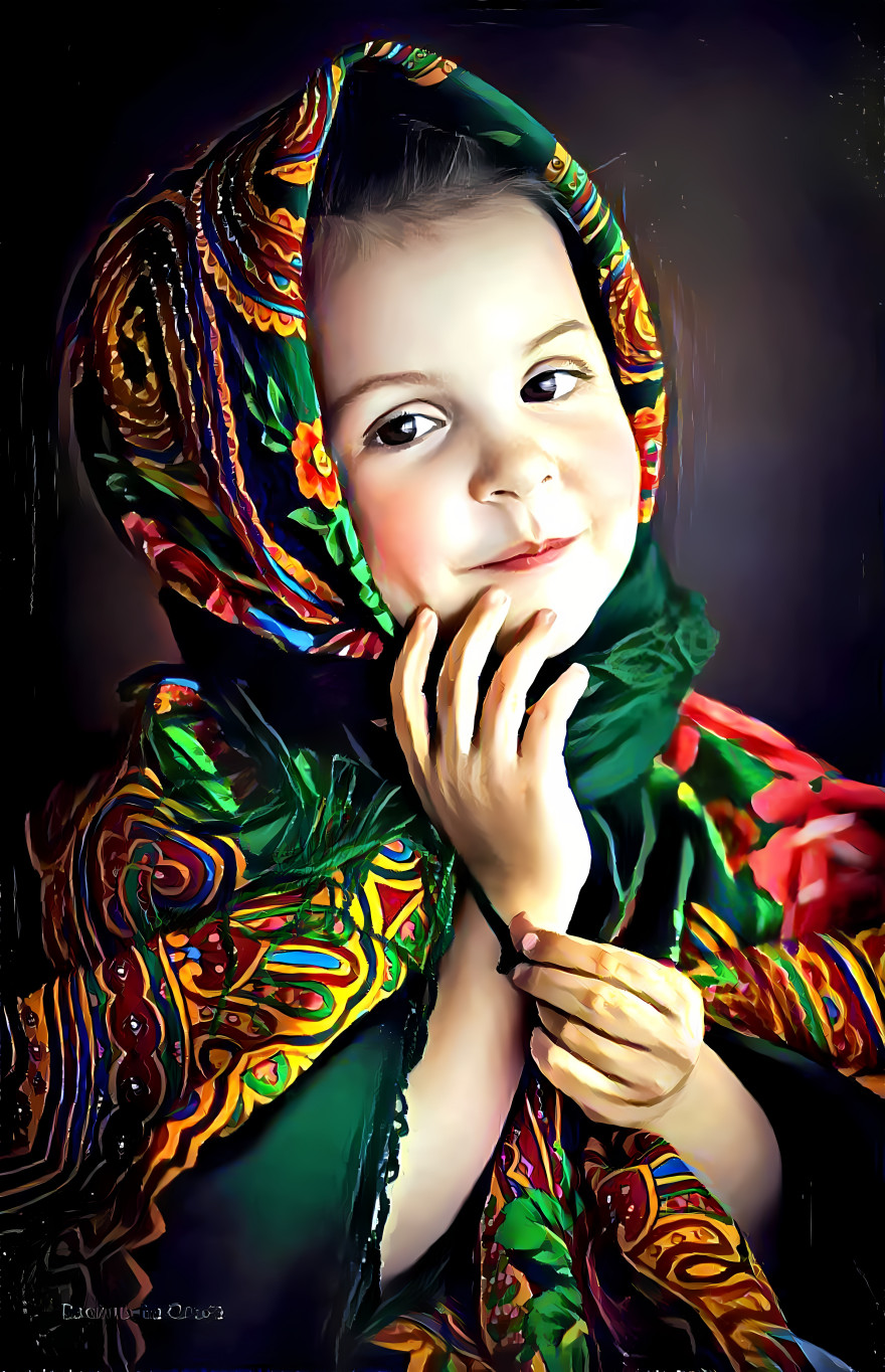 A little girl in a headscarf