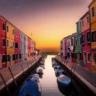Venice Canal with Gondolas Amid Colorful Buildings and Lightning Sky