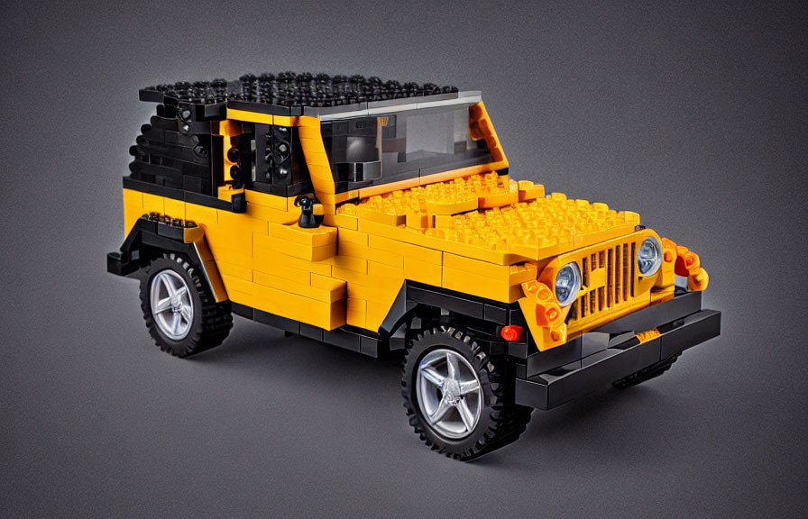 Detailed LEGO Yellow and Black Off-Road Vehicle Model with Silver Rims